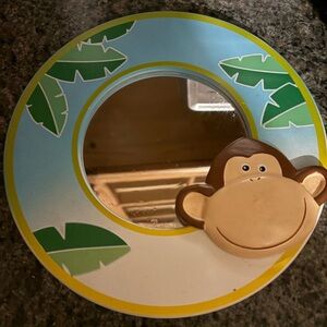 Monkey Themed Round Mirror with Leaf Accents
